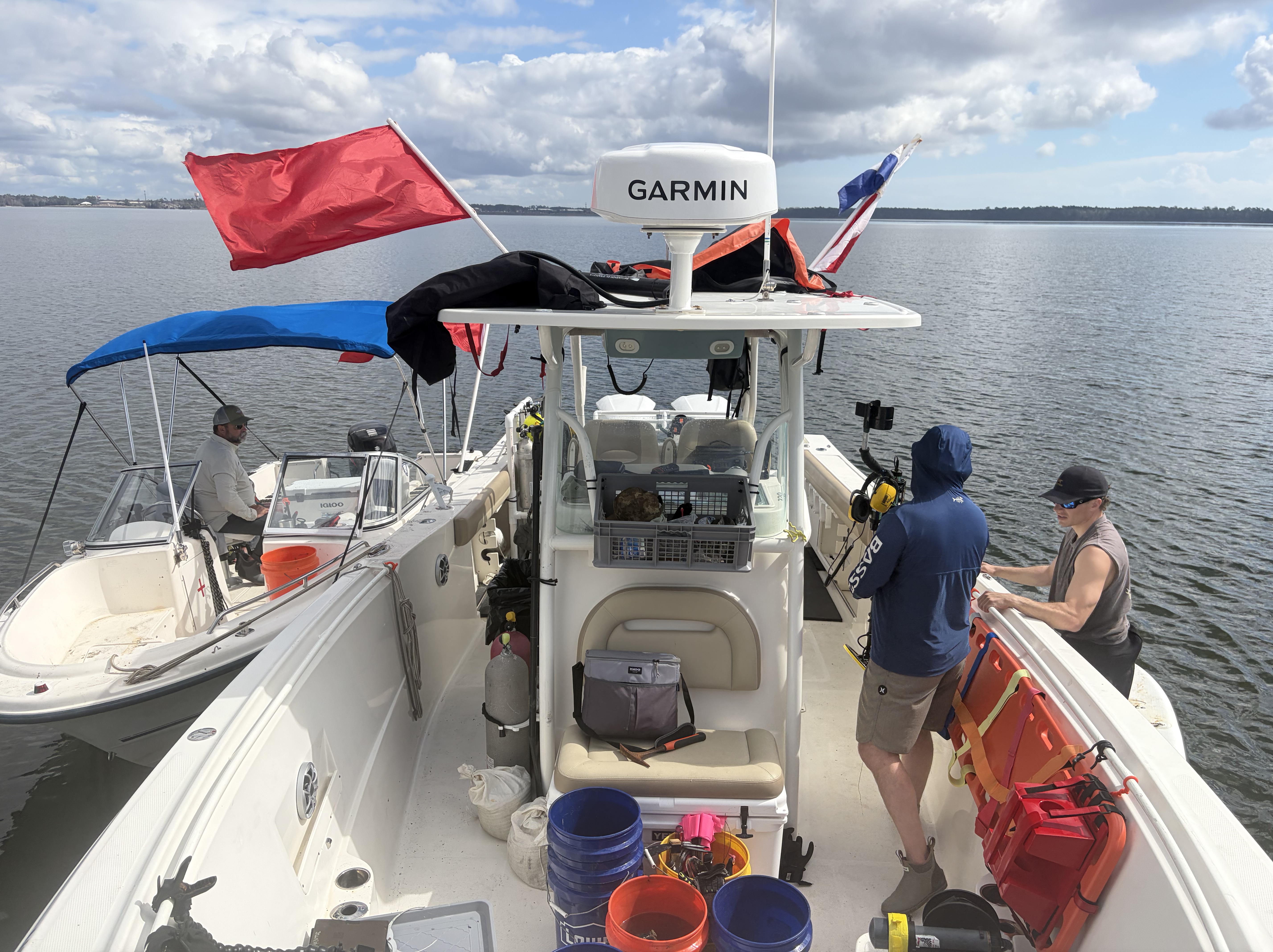 Crew and dive gear staged on deck during a range support operation